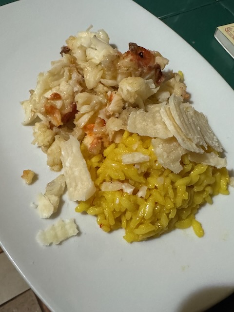 Risotte alle milanese with lobster and grated parmigiano reggiano
